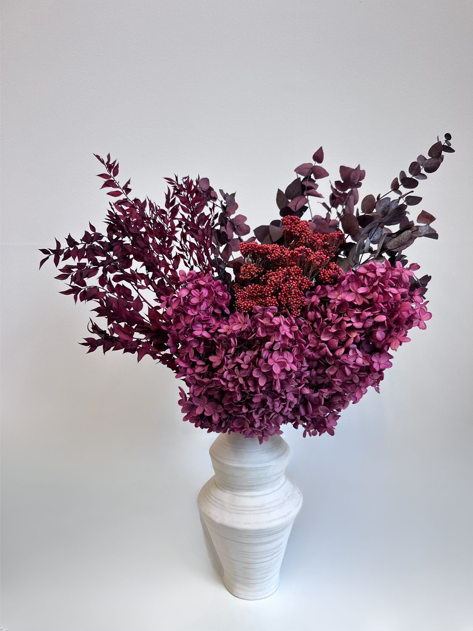 Vivienne β Boysenberry Preserved Flower Arrangement in White Jagged Vase β Luxe