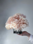 Side view of the small Mirror Hydrangea arrangement and its mirrored cube vase