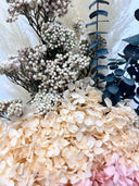 Detail of cream hydrangea, gypsophila and blue-green eucalyptus in the Noelle bouquet