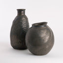 Colin Vase shown with other vases