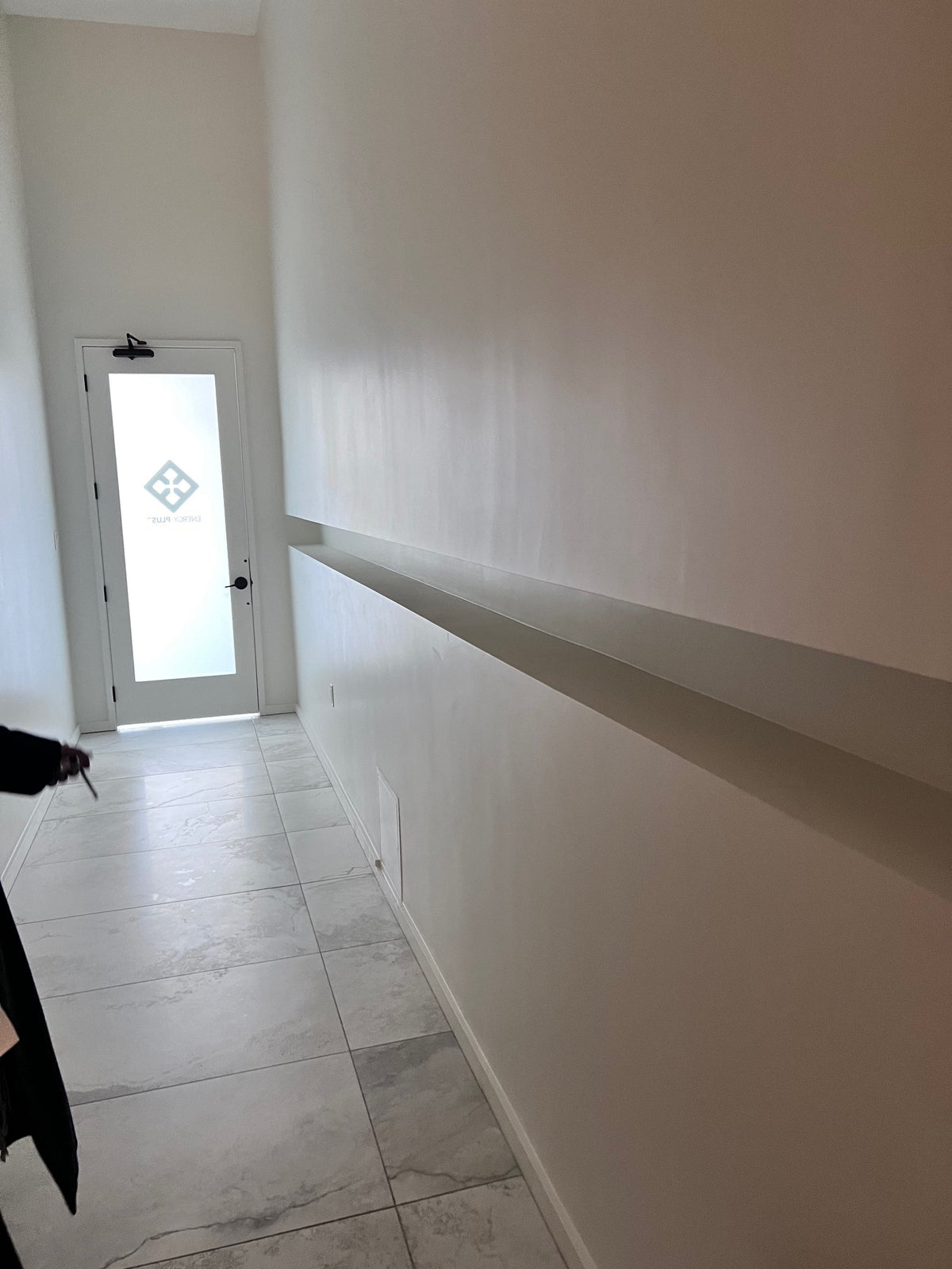 Before: the empty wall channel along the Energy Plus corridor