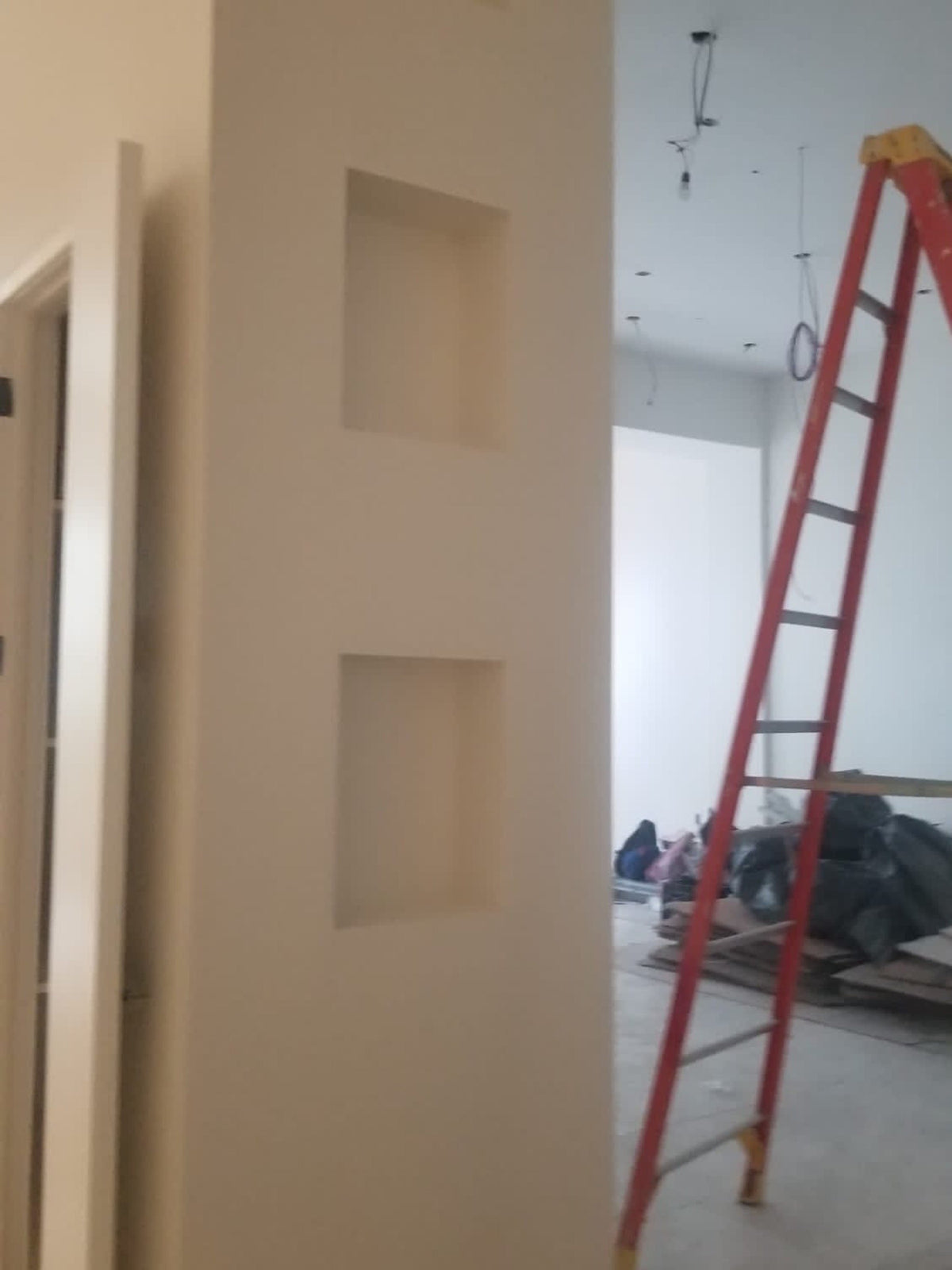 Before: the wall niches at Energy Plus during construction