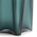 Close-up of the Eric Vase’s teal glass surface