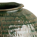 Close-up of the Evan Small Vase’s green ceramic surface