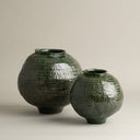 Evan Small Vase shown with other vases