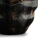 Close-up of the Fabian Small Vase’s black and brown ceramic surface