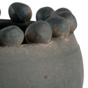 Close-up of the Greyson Bowl’s black-brown ceramic surface