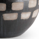 Close-up of the Jude Vase’s black-brown ceramic surface
