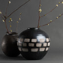 Jude Vase shown with other vases
