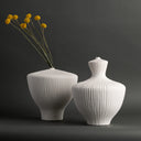 Marvin Vase shown with other vases