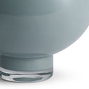 Close-up of the Piper Small Vase’s blue glass surface