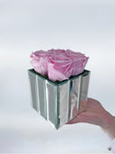 Lilac preserved roses in a mirrored square box