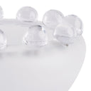 Close-up of the Ruby Bowl’s frosted and clear glass surface