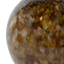 Close-up of the Ryder Vase’s amber glass surface