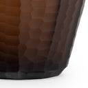 Close-up of the Usher Vase’s brown glass surface